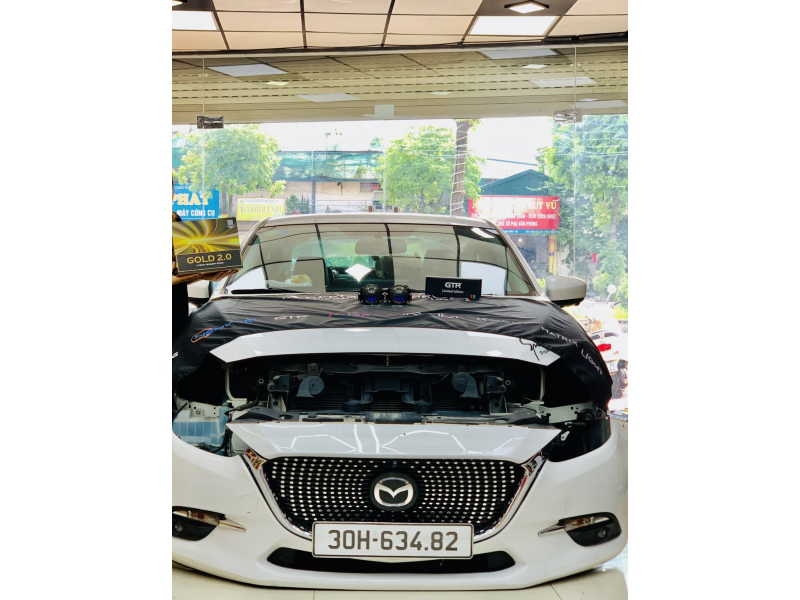 Độ đèn nâng cấp ánh sáng Bi Titan Gold 2.0 cho xe Mazda 3